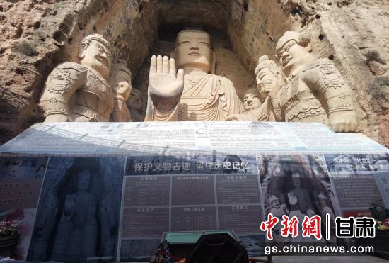 時下，中國“石窟鼻祖”天梯山石窟第13窟大佛足部與局部危巖體搶救性保護項目正在施工。圖為施工現(xiàn)場。陳曉斌 攝