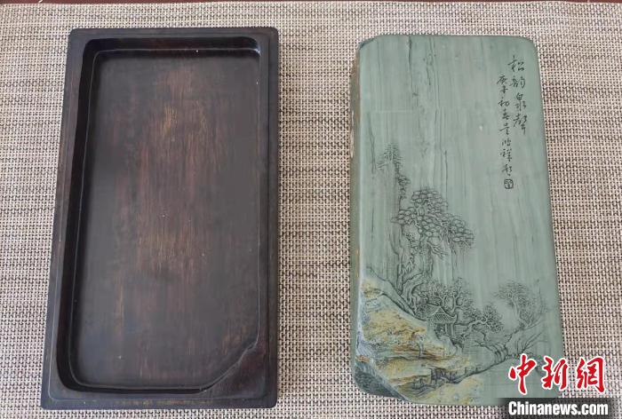 圖為盧保勝為提升洮硯文化內(nèi)涵，制作“一硯一銘、一盒一拓”成品展示。　張婧 攝